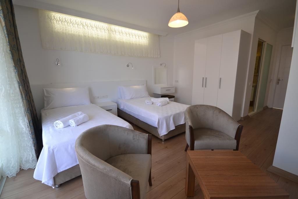 Kelebek Studio Apartments Калкан Стая снимка