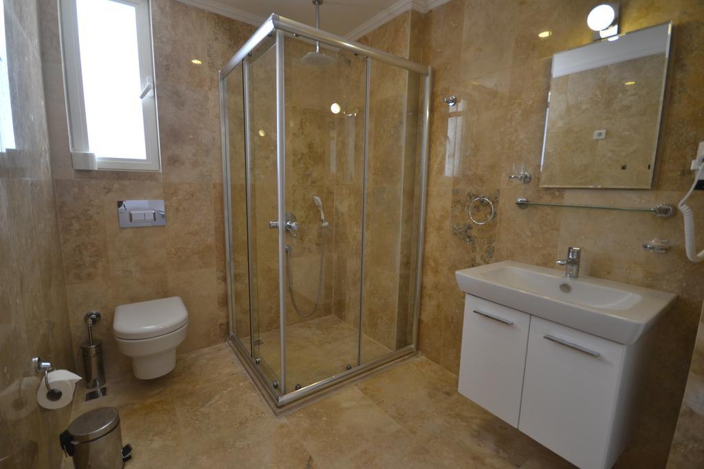 Kelebek Studio Apartments Калкан Стая снимка